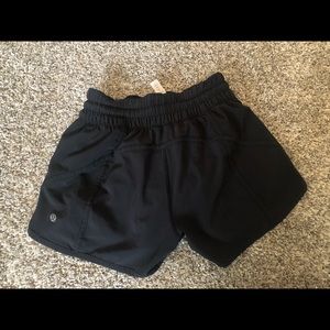 Black Lululemon Hotty Hot 4 inch shorts